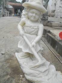 Marble Child Statue carving Sculpture Garden carving photo image