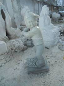 Marble Child Statue carving Sculpture Garden carving photo image